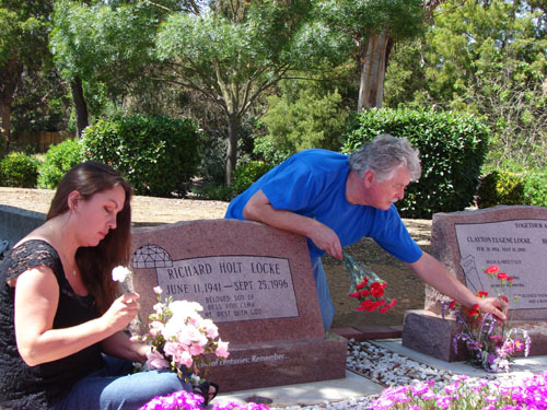Cheryl and her Uncle Bob freshening her flowers</i>