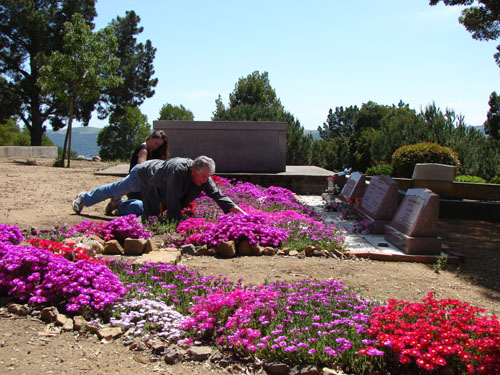 Cheryl and Uncle Bob tending to the flowers</i>