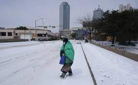 A person walking in the snow

Description automatically generated with low confidence