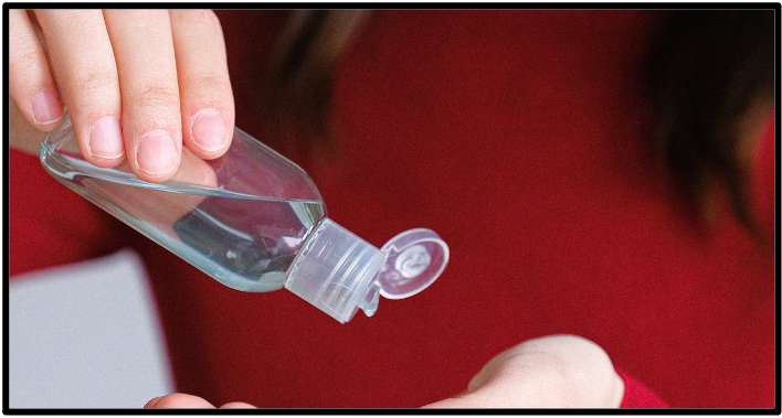 Woman Applying Hand Sanitizer · Free Stock Photo